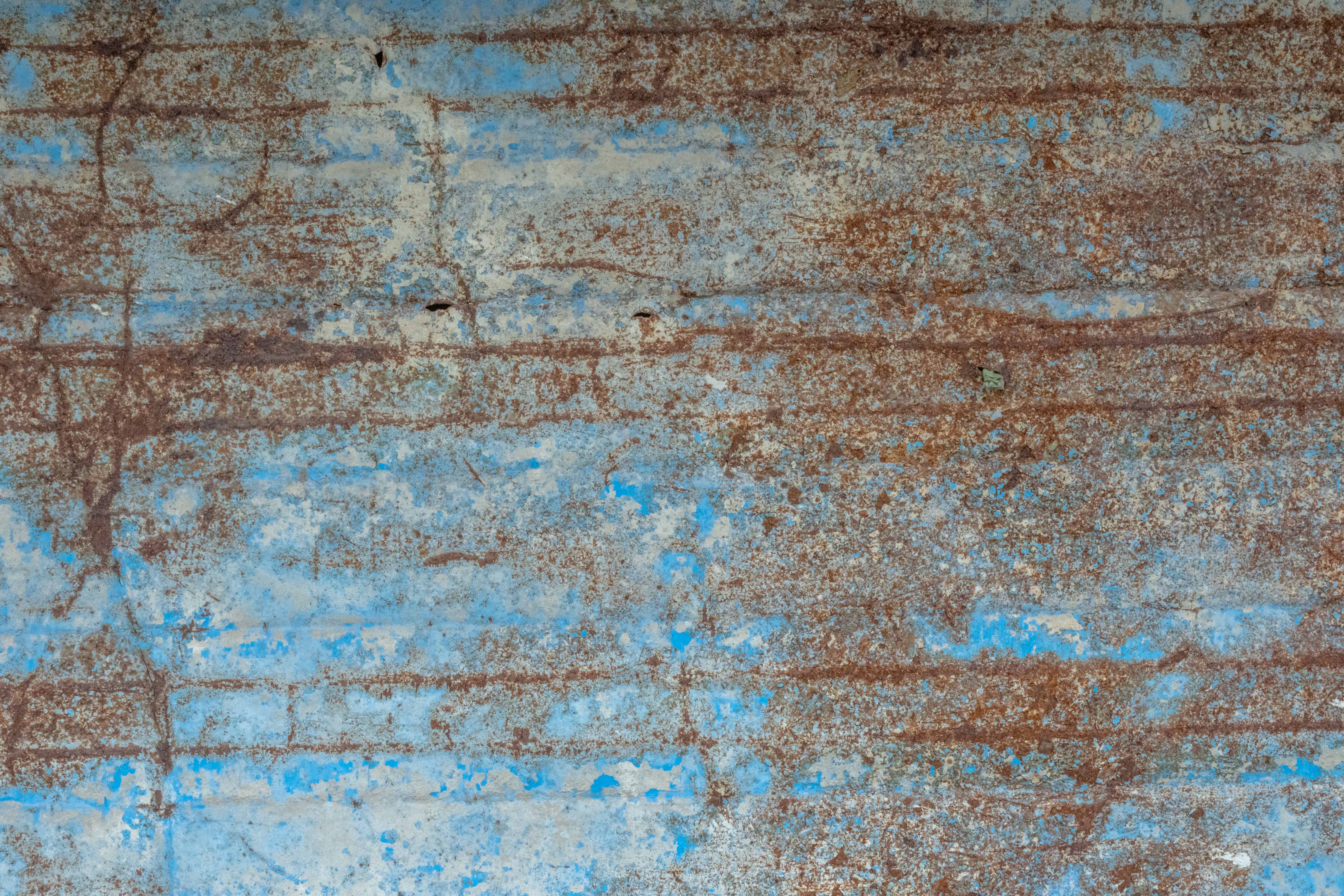 Grungy Weathered Blue Painted Corrugated Steel Sheet with Rust and Peeling Paint Texture in 6k resolution