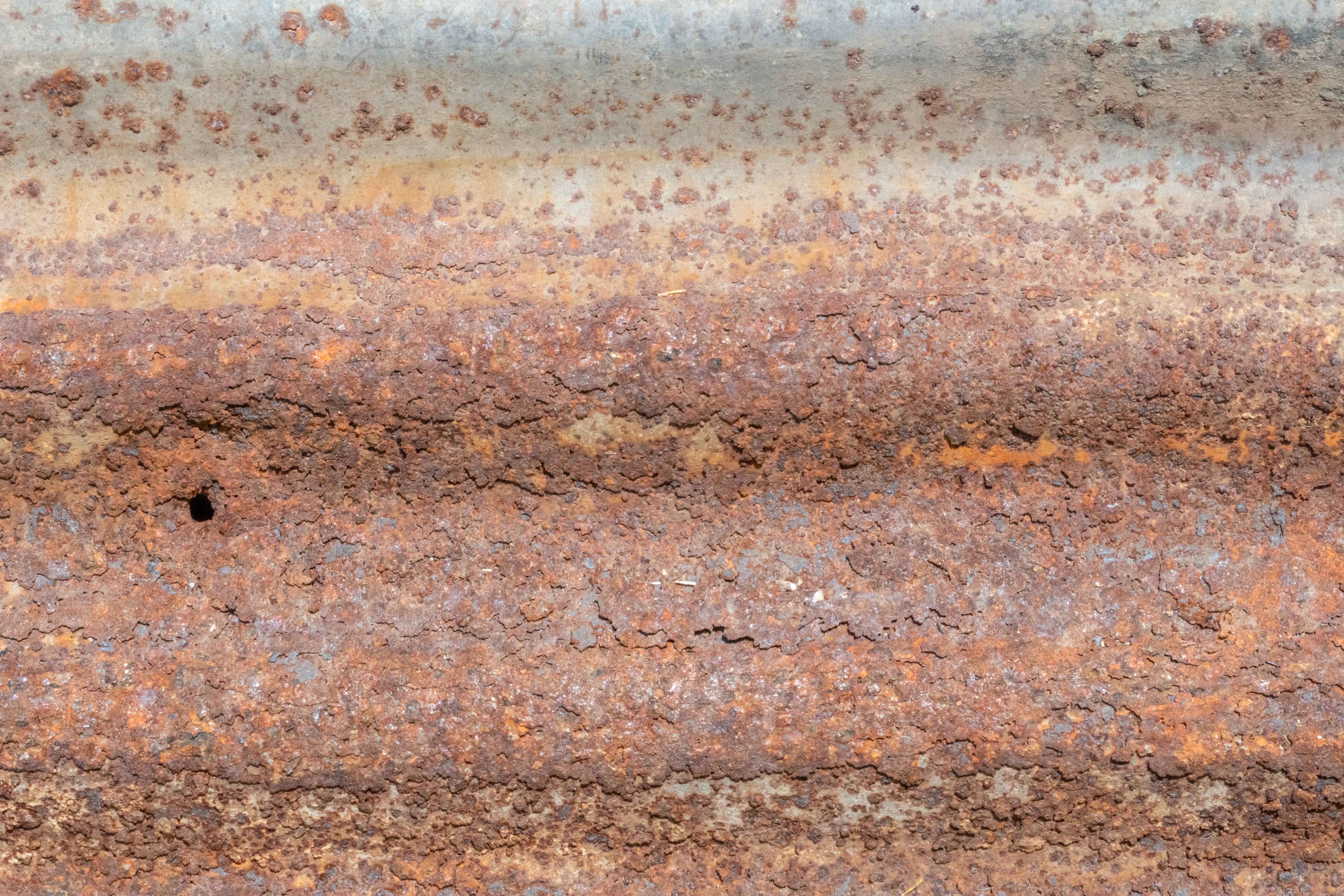 Heavily Corroded Corrugated Galvanized Steel Sheet with Rust Scale and Pitting Texture in 8K