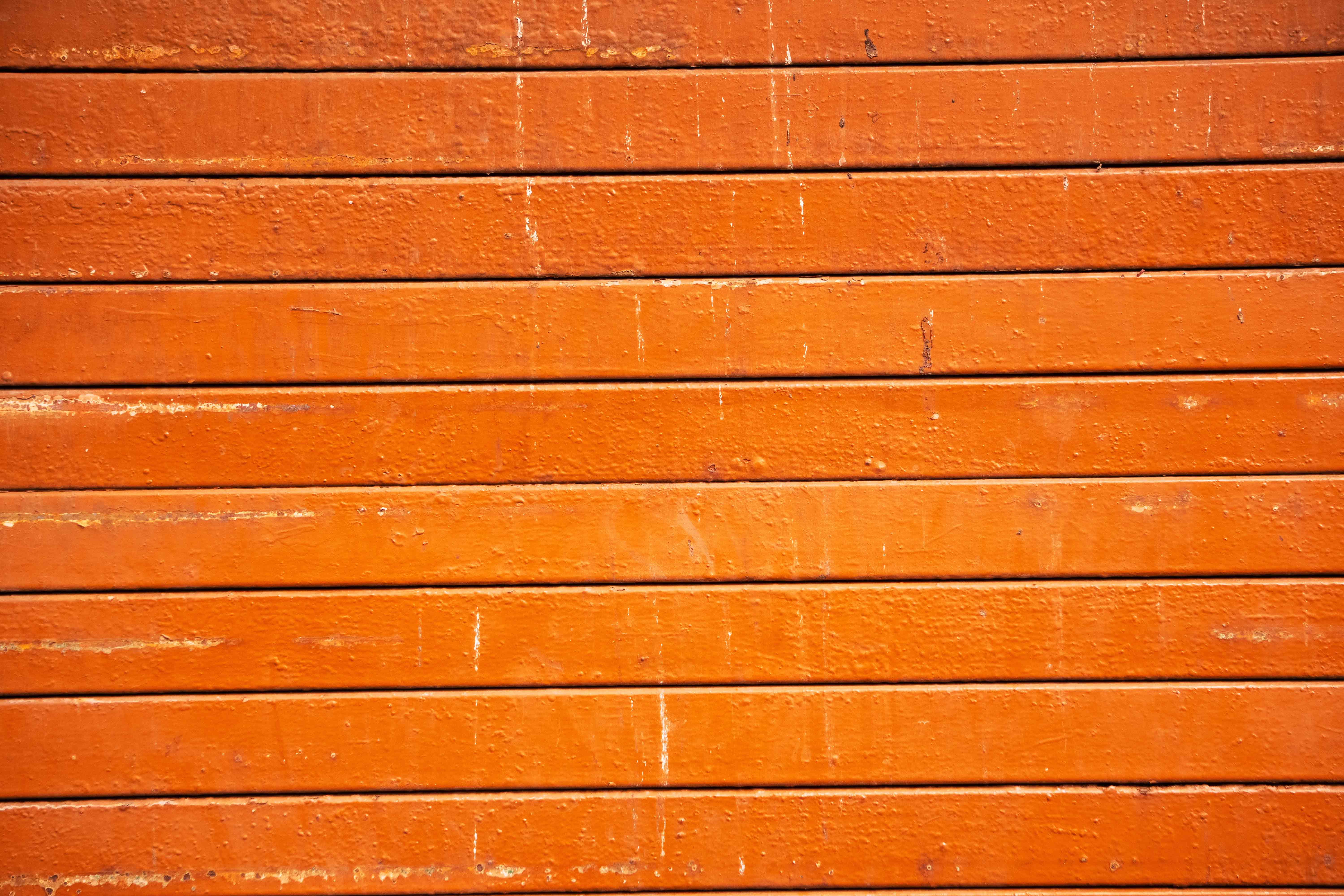 Orange Painted Metal Rolling Shutter Texture with Horizontal Steel Slats