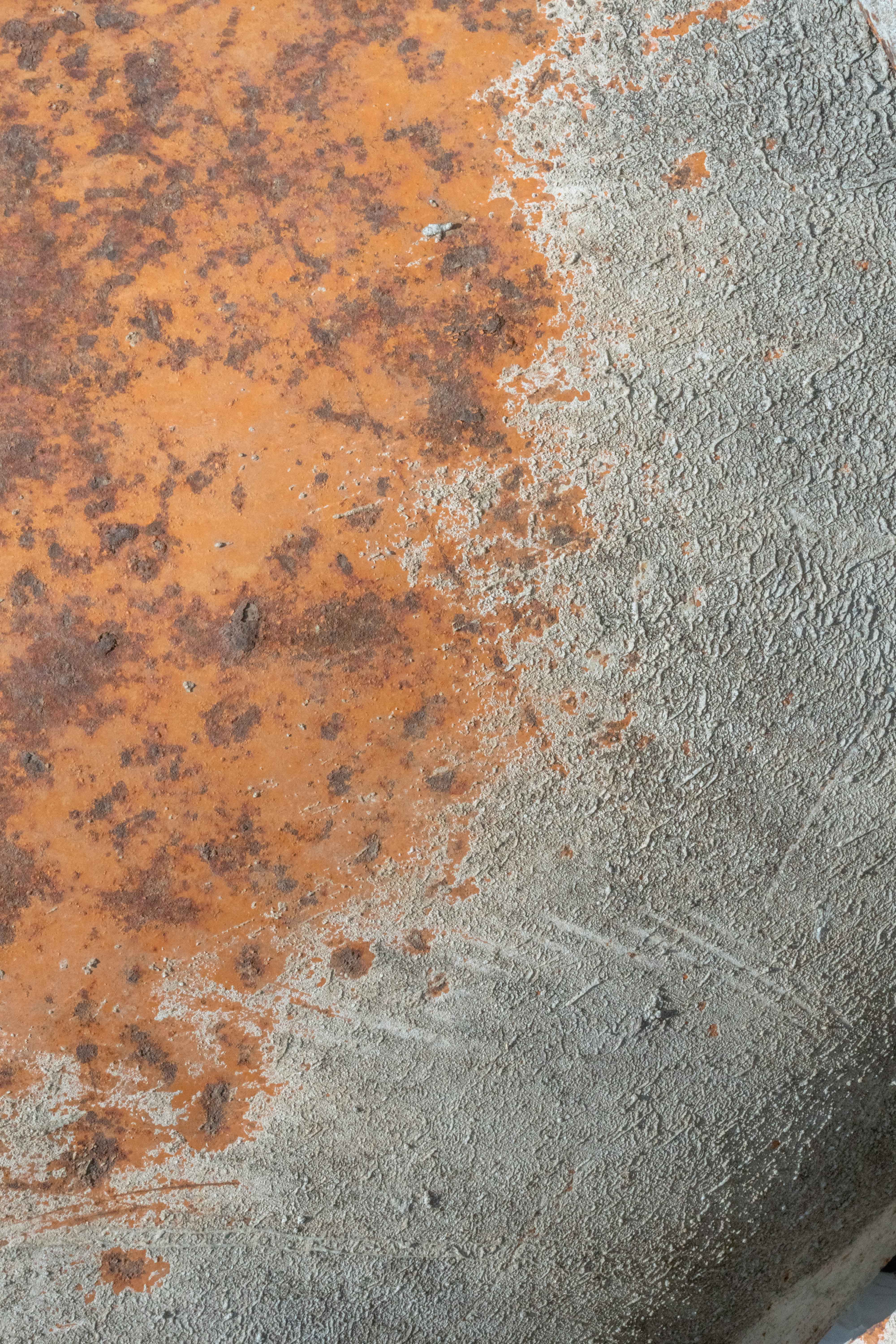Weathered metal surface with rust and concrete texture in HD