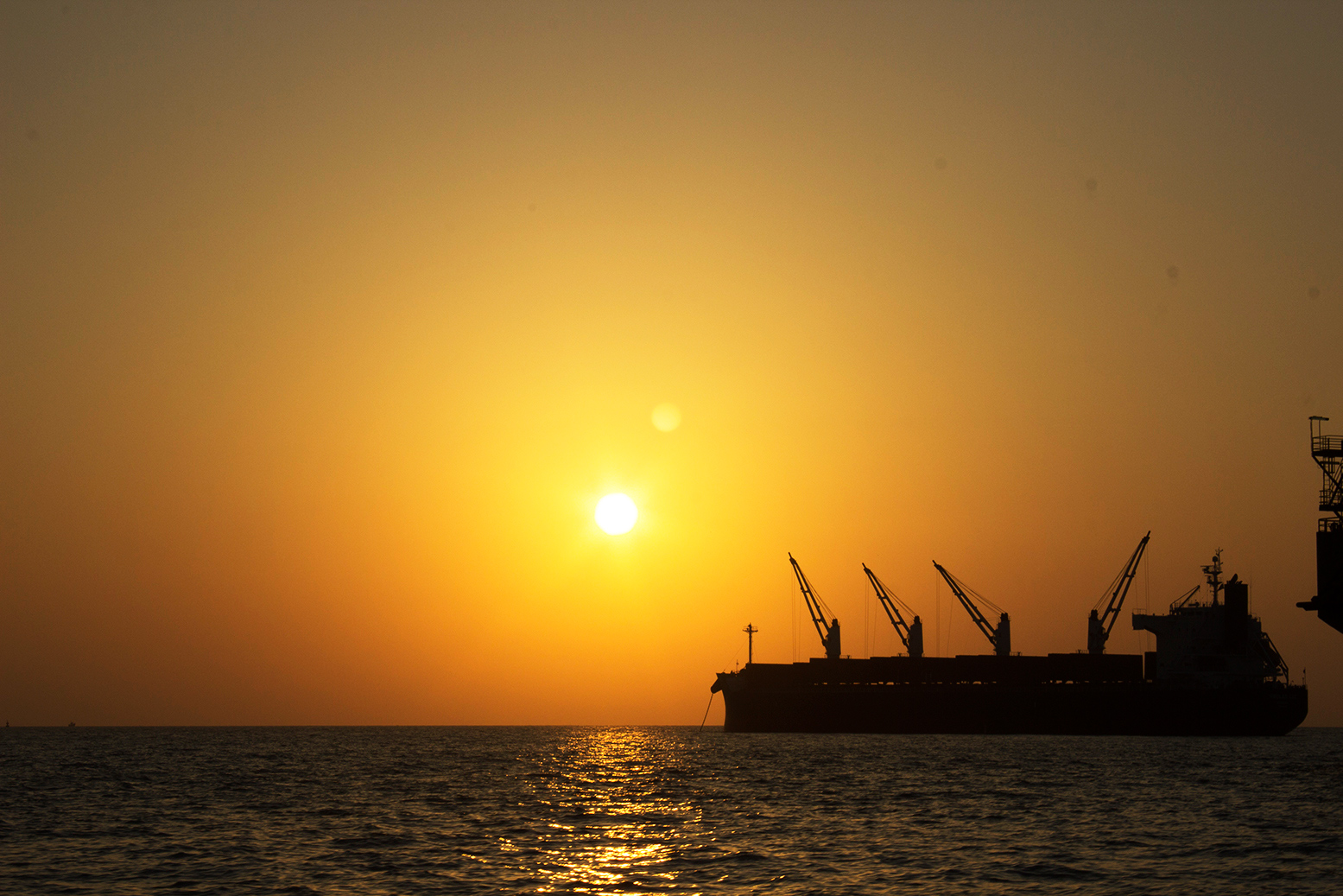 Silhouette of a ship in sea